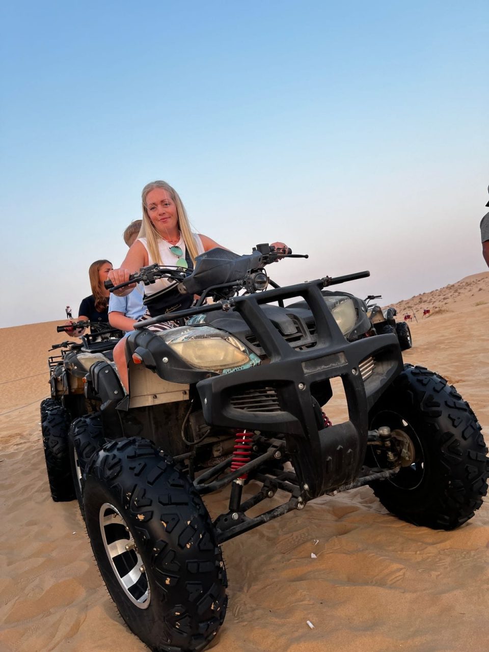 Guests enjoying VIP Desert Safari with ATV quad biking in Abu Dhabi desert
